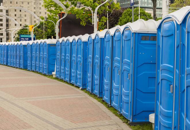 hygienic portable restrooms lined up at a beach party, ensuring guests have access to the necessary facilities while enjoying the sun and sand in Hallandale Beach, FL